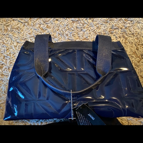 Dkny Handbags - Navy blue DKNY purse new with tags